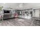 Bright open-concept living space with an island kitchen and contemporary design at 7386 Campbell Ranch Ave, Las Vegas, NV 89179