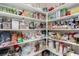 Walk-in pantry offers ample shelf storage for food, beverages, and small kitchen appliances at 7386 Campbell Ranch Ave, Las Vegas, NV 89179