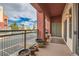 Spacious balcony with vibrant views and potted plants, perfect for outdoor relaxation at 75 E Agate Ave # 204, Las Vegas, NV 89123