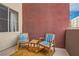 Relaxing balcony area with comfortable seating, offering a cozy outdoor space at 75 E Agate Ave # 204, Las Vegas, NV 89123