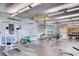 Spacious gym with modern equipment and a spiral staircase at 75 E Agate Ave # 204, Las Vegas, NV 89123