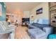 Bright living room with wood floors, modern furniture, and an open layout at 75 E Agate Ave # 204, Las Vegas, NV 89123