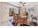 Inviting dining area with a colorful rug and access to outdoor space at 7945 Delbonita Ave, Las Vegas, NV 89147
