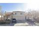 Charming two-story home featuring a terracotta roof, two-car garage, and well-maintained landscaping at 7945 Delbonita Ave, Las Vegas, NV 89147