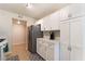 Functional kitchen showcasing ample storage, stainless steel refrigerator, and tile floors at 7945 Delbonita Ave, Las Vegas, NV 89147