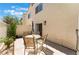 Outdoor patio space with table and chairs at 7945 Delbonita Ave, Las Vegas, NV 89147