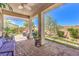 A covered patio offers respite in a spacious backyard at 797 Drammatico Pl, Henderson, NV 89011
