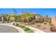 Beautiful single-story home with landscaped front yard, desert landscaping, and a two-car garage at 797 Drammatico Pl, Henderson, NV 89011