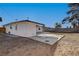 Backyard view showing the concrete patio and side exterior of the property at 824 N 20Th St, Las Vegas, NV 89101