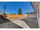 Backyard featuring partial concrete pad, privacy fence, and gravel at 824 N 20Th St, Las Vegas, NV 89101