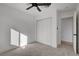 Bedroom featuring neutral carpet, white walls, closet and modern ceiling fan at 824 N 20Th St, Las Vegas, NV 89101