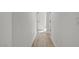 Hallway featuring light wood floors and white walls at 824 N 20Th St, Las Vegas, NV 89101