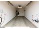 Spacious, unfinished two-car garage provides ample storage and parking at 8242 Vino Merlot Ave, Las Vegas, NV 89113