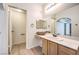 Well-lit bathroom with a large vanity, ample counter space, and modern fixtures at 8408 Running Deer Ave # 201, Las Vegas, NV 89145