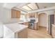 Efficient kitchen with tile countertops, stainless steel appliances, and ample cabinet space at 8408 Running Deer Ave # 201, Las Vegas, NV 89145
