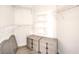 Spacious walk-in closet with custom shelving and stylish storage solutions at 8408 Running Deer Ave # 201, Las Vegas, NV 89145