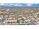 Aerial view of community featuring lush landscaping, covered parking, and community pool at 950 Seven Hills Dr # 124, Henderson, NV 89052