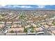 Community featuring lush landscaping, covered parking, and community pool at 950 Seven Hills Dr # 124, Henderson, NV 89052