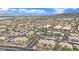 Community featuring lush landscaping, covered parking, and community pool at 950 Seven Hills Dr # 124, Henderson, NV 89052