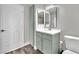 Well-lit bathroom featuring modern vanity, sleek mirror, and stylish fixtures at 950 Seven Hills Dr # 124, Henderson, NV 89052