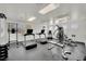 Well-equipped community gym with treadmills, weights, and ample workout space at 950 Seven Hills Dr # 124, Henderson, NV 89052