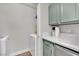 Convenient laundry area featuring a washer and dryer, plus storage cabinets at 950 Seven Hills Dr # 124, Henderson, NV 89052