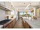 Contemporary kitchen with stainless steel appliances, and a large island at 9533 Orient Express Ct, Las Vegas, NV 89145
