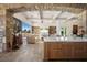 The living room features an open floor plan with exposed beam ceilings and natural lighting at 9533 Orient Express Ct, Las Vegas, NV 89145