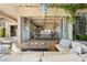 Inviting covered outdoor patio seamlessly connects to the home's interior dining area, perfect for entertaining at 9533 Orient Express Ct, Las Vegas, NV 89145