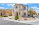 Charming two-story home featuring low maintenance landscaping and a quaint front facade at 9785 Iron Mine St, Las Vegas, NV 89183