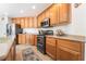 Bright kitchen featuring ample counter space, stainless steel appliances, and modern lighting at 9785 Iron Mine St, Las Vegas, NV 89183