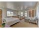 Bright bedroom with plenty of natural light, large bed, and room to play at 9992 Sky Parlor Rd, Las Vegas, NV 89178