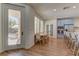 Bright dining area adjacent to the kitchen and outdoor patio at 9992 Sky Parlor Rd, Las Vegas, NV 89178