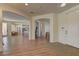 Inviting home foyer with open floor plan, wood floors, and neutral color palette at 9992 Sky Parlor Rd, Las Vegas, NV 89178