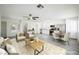 Bright, open concept living and dining area with neutral decor and modern finishes and lots of light at 10 Yew Ave, Las Vegas, NV 89110