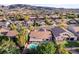 An aerial shot showcasing the backyard pool and patio area nestled within a well-maintained residential neighborhood at 1078 Sandstone Canyon St, Henderson, NV 89012