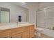 Bathroom featuring a shower, sink, mirror, and tile flooring at 1078 Sandstone Canyon St, Henderson, NV 89012