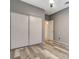 This bedroom features modern floors, a closet, and light colored walls at 1078 Sandstone Canyon St, Henderson, NV 89012