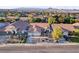 Charming single-story home featuring a well-manicured front yard, desert landscaping, and an attached two-car garage at 1078 Sandstone Canyon St, Henderson, NV 89012