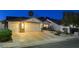 Charming single-story home featuring a three-car garage, manicured landscaping, and inviting curb appeal at 1078 Sandstone Canyon St, Henderson, NV 89012