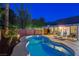 Backyard featuring a pool, patio, and desert landscaping, perfect for outdoor enjoyment at 1078 Sandstone Canyon St, Henderson, NV 89012