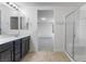 Bright bathroom with a large walk-in shower and modern sink at 10925 Jordyn Hill St, Las Vegas, NV 89141