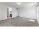 Large bedroom with neutral walls, carpet, and access to the en suite bathroom at 10925 Jordyn Hill St, Las Vegas, NV 89141