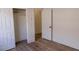 Spacious bedroom with closet and wood-look floors at 1100 Warm Canyon Way, Las Vegas, NV 89123