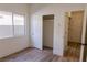 Bright bedroom with closet and wood-look floors at 1100 Warm Canyon Way, Las Vegas, NV 89123