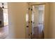Hallway with wood-look floors leading to living area at 1100 Warm Canyon Way, Las Vegas, NV 89123