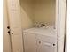 Laundry room featuring a stacked washer and dryer at 1100 Warm Canyon Way, Las Vegas, NV 89123