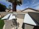 An outdoor kitchen with built in counters, stainless steel grill, and privacy walls at 1100 Warm Canyon Way, Las Vegas, NV 89123