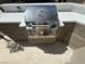 Stainless steel grill and outdoor kitchen area with granite countertops at 1100 Warm Canyon Way, Las Vegas, NV 89123