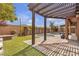 Backyard featuring a pool, patio, pergola, and grassy area at 11274 Felice Cohn Ct, Las Vegas, NV 89179